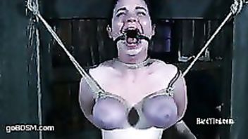 A busty pain slut endures severe and unique tit torture