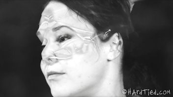Stunning beauty gets her face taped and pussy punished by hot skinny mistress